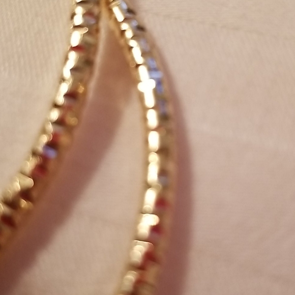Gold bangle with balls on end Clearance